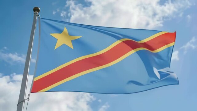 Fluttering national flag responding to gusts at outdoor pole, revealing red stripe and star