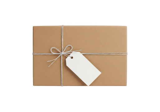 Brown cardboard gift box with string and blank tag isolated on transparent background for sales