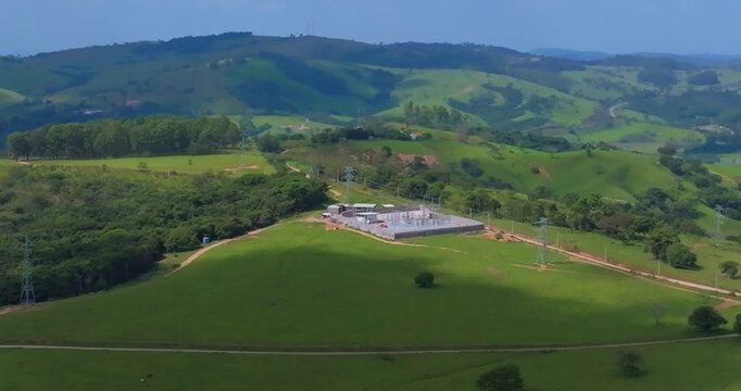 Electrical transmission substation surrounded by cattle pastureland and fragmented woodland Santo Ant&ocirc;nio do Monte, Minas Gerais, Brazil within a rural Atlantic Forest and Cerrado transition aerial