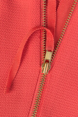 Unzipped fabric closeup © Tarzhanova