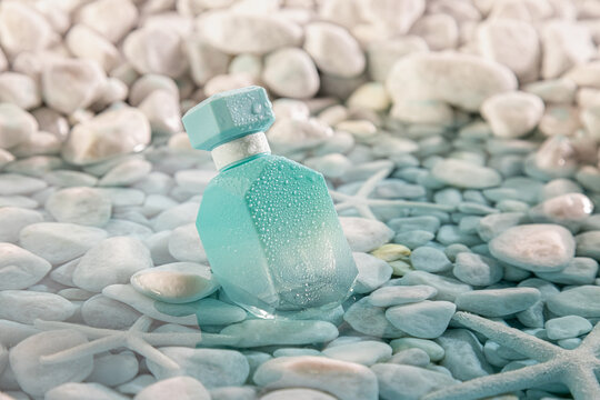 Intense blue perfume as scent of sea breeze on beach.