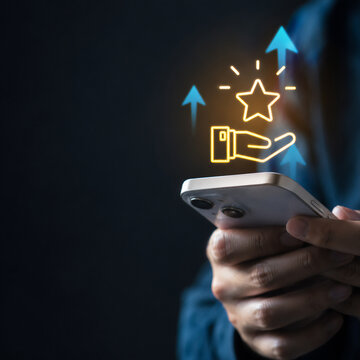 Hand holding smartphone with star rating and arrows pointing up for customer satisfaction