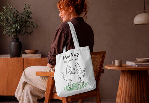 Canvas tote bag mockup on woman shoulder lifestyle scene