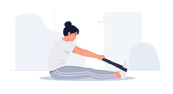 Woman stretching hamstrings with resistance band, seated exercise, fitness, home workout
