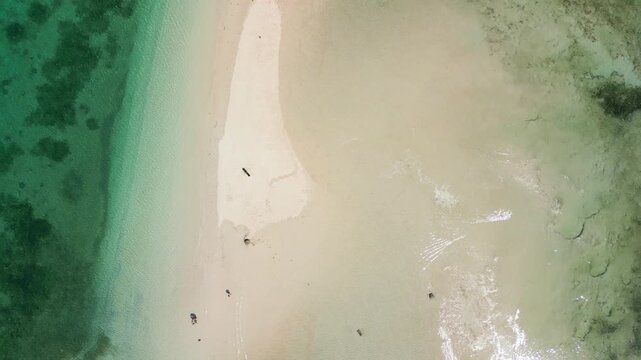 Drone perspective of Gili Kere sandbar with turquoise waters and clear coastline