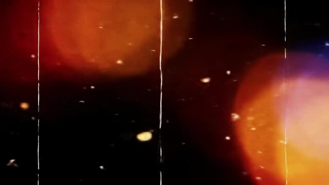 Luminous, organic light leaks in fiery reds, oranges, and electric blues drift on black void. Soft focus, bokeh, film grain, dust, and drift camera enhance a nostalgic vintage film aesthetic.