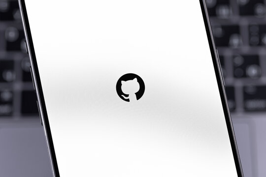 GitHub logo mobile app on a screen smartphone iPhone closeup. GitHub is the largest web service for hosting and developing IT projects. Batumi, Georgia - March 25, 2026