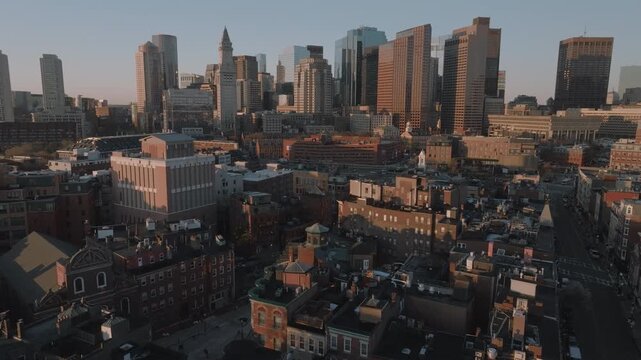 Handheld shot of a MBTA train arriving at the station. Shot on a spring day in Boston.