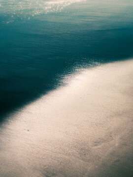 reflection of the sun on the beach