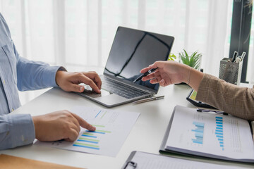 Fototapeta premium Asian business people calculate financial company