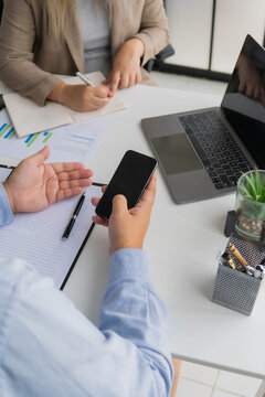 Asian business people vdo conferance on laptop in office