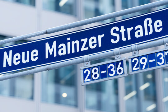 Neue Mainzer Strasse appears in Frankfurt Germany, tying business district architecture to an urban street address and office detail