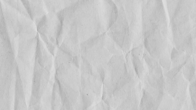 Crumpled paper unfolding stop motion animation for education and school texture background.Video effect for video editing.