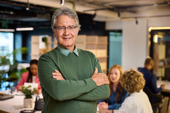 Successful senior businessman looking at camera with confidence