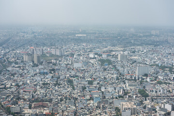 Fototapeta premium Modern architecture building cityscape of Ho Chi Minh city skyline. Areal view of Saigon Vietnam