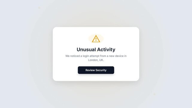 Unusual Activity Alert on Screen with Security Button Prompting Action.