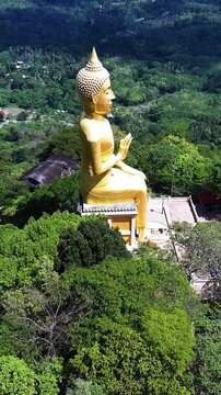 Drone View of Buddha in the mountains of thailand
