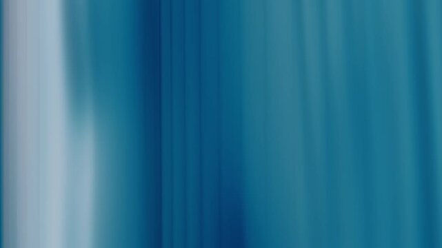 Blue flowing vertical curtain background