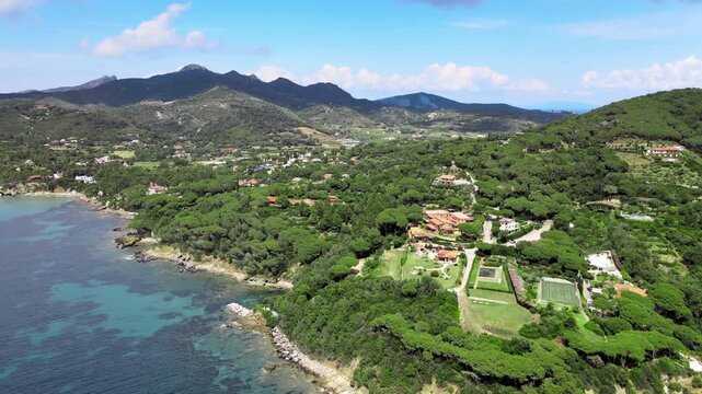 Aerial view of Elba Island. Southern Coastline in summer season. Drone viewpoint. Slow motion