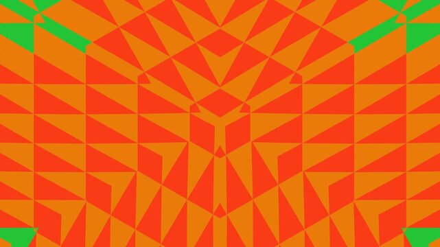 Geometric pattern of orange triangles and green shapes forming a colorful design