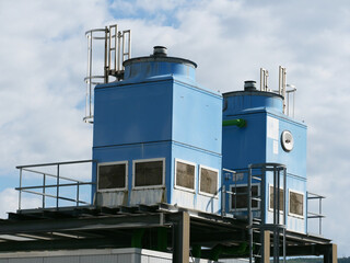 Obraz premium Cooling towers are used for industrial cooling through evaporation