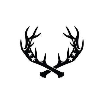 Black silhouette of crossed deer antlers with white star cutouts on a white background
