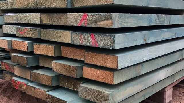 stack of planed construction boards, a bottom-up view