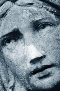 Dramatic stone portrait inspired by Cassandra from Greek mythology with haunting gaze