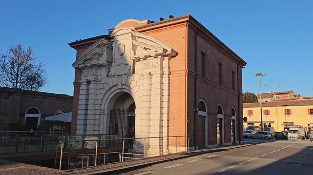 Historic gateway in Ferrara old town, Italy