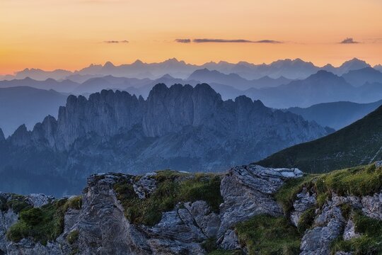 Fribourg Prealps with Gastlosen mountain range at dawn, Bernese Alps behind, cantons of Fribourg and Bern, Switzerland