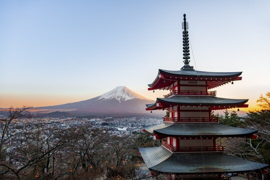 Five-story pagoda of a Shinto Shrine, Chureito Pagoda, with views of Fujiyoshida City and Mount Fuji volcano at sunset, Arakura Fuji Sengen Shrine, Arakurayama Sengen Park, Yamanashi Prefecture, Japan