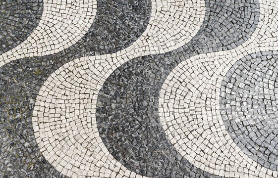 Wavy pattern in pavement, black and white, cobblestones, Rossio, Lisbon, Portugal