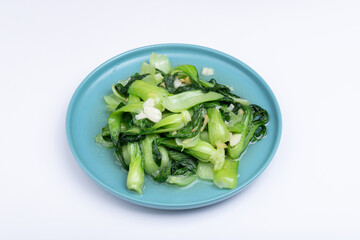 Obraz premium The stir-fried vegetables with green leaf lettuce on the plate