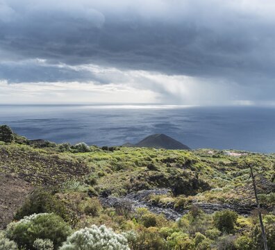 Monta&ntilde;a del Azufre, small volcano, threatening clouds, northeast of La Palma, Canary Islands, Spain