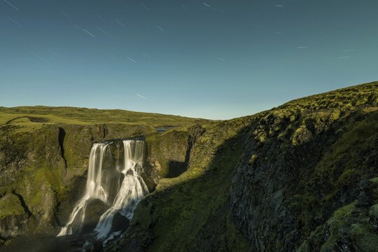 Star trails, Fagrifoss waterfall, Geirlands&aacute; river, Lakagigar region, Vatnaj&ouml;kull National Park, Highlands, Iceland