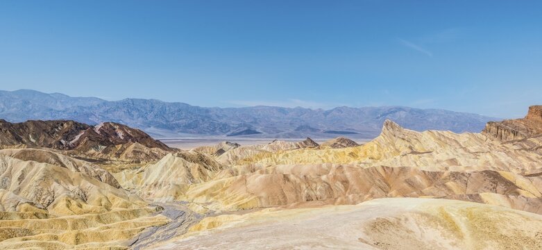 Panoramic view, Manly Beacon rock, Badlands, Zabriskie Point,  Panamint Range behind, Death Valley National Park, California, USA