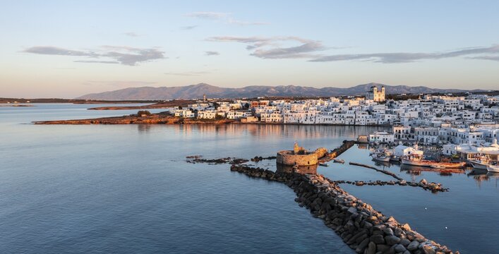 Evening atmosphere, aerial view, town view and harbour of Naoussa, harbour wall with Venetian ruins, Paros, Cyclades, Greece