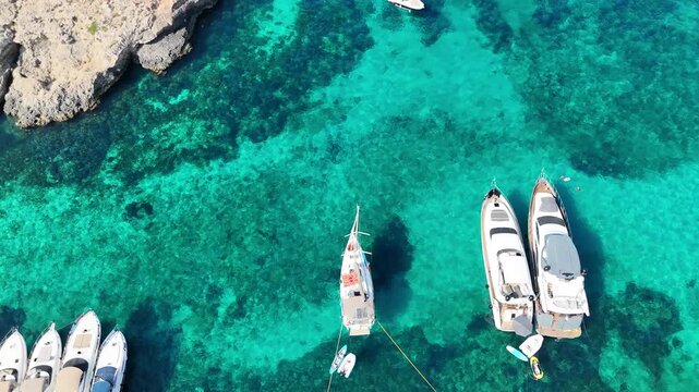 Aerial drone view of turquoise waters at Comino Blue Lagoon, Malta