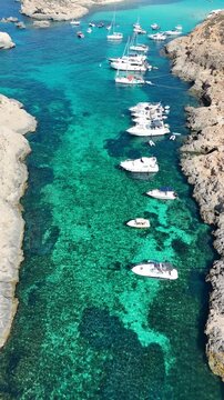 Aerial drone view of turquoise waters at Comino Blue Lagoon, Malta