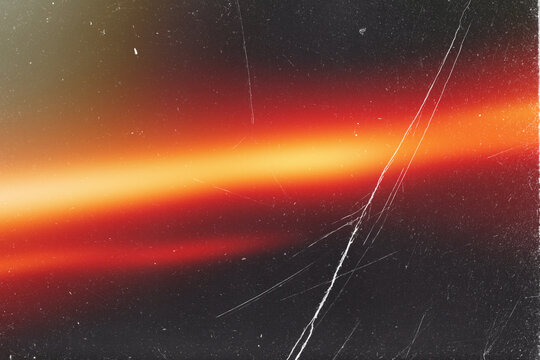 light leak overlay effect with scratch dust and motion blur red light leaks,retro noisy film texture light leak flare on black background,abstract background with ray,grunge film strip background