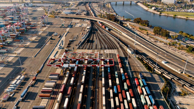 Drone view of freight rail yard containers and port infrastructure