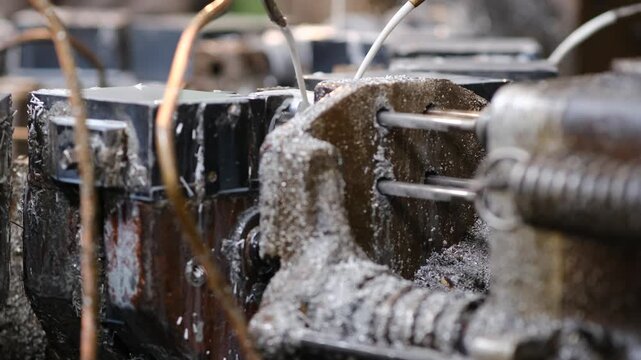 Close Up Of Industrial Metal Milling Process With Heavy White Coolant Flow