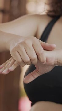 Closeup woman holds his wrist. hand injury, feeling pain. Health care and medical concept. and those with a family history of degenerative knuckles.	