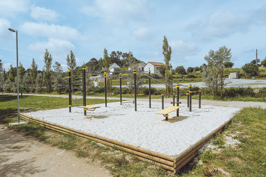 Calisthenics and Street Workout Rig - Outdoor Gym, Santa Comba D&atilde;o, Portugal, public fitness Calisthenics equipment in a green park environment