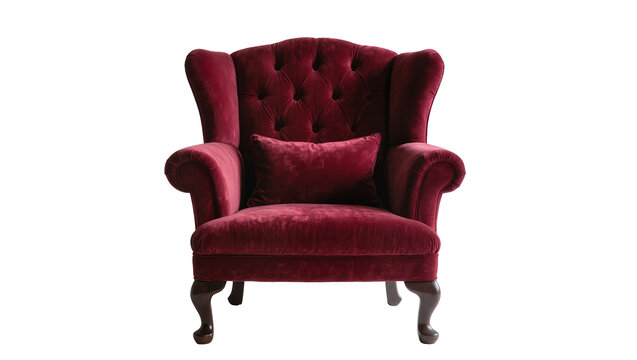 Deep red velvet wingback armchair with tufted back and lumbar pillow, isolated on transparent background