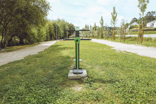 Twister and Pendulum / Ski Station - Outdoor Gym, Santa Comba D&atilde;o, Portugal, public fitness Calisthenics equipment in a green park environment