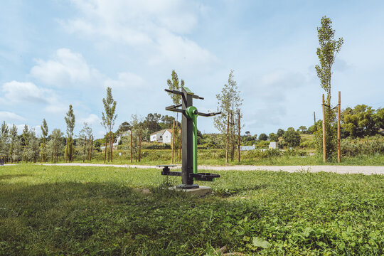 Twister and Pendulum / Ski Station - Outdoor Gym, Santa Comba D&atilde;o, Portugal, public fitness Calisthenics equipment in a green park environment