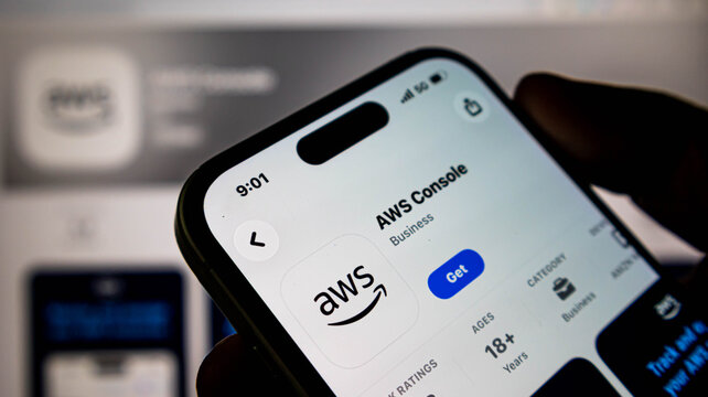 Closeup of a smartphone screen displaying the aws console app on the apple app store, showcasing the official amazon web services mobile application interface