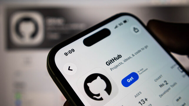Closeup of a smartphone screen showing the github app page in the apple app store, with the app icon and download button visible