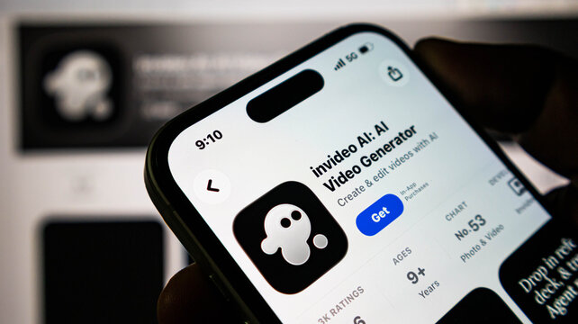 Closeup of a smartphone screen displaying the invideo ai video generator app on the apple app store, showcasing mobile technology and digital innovation